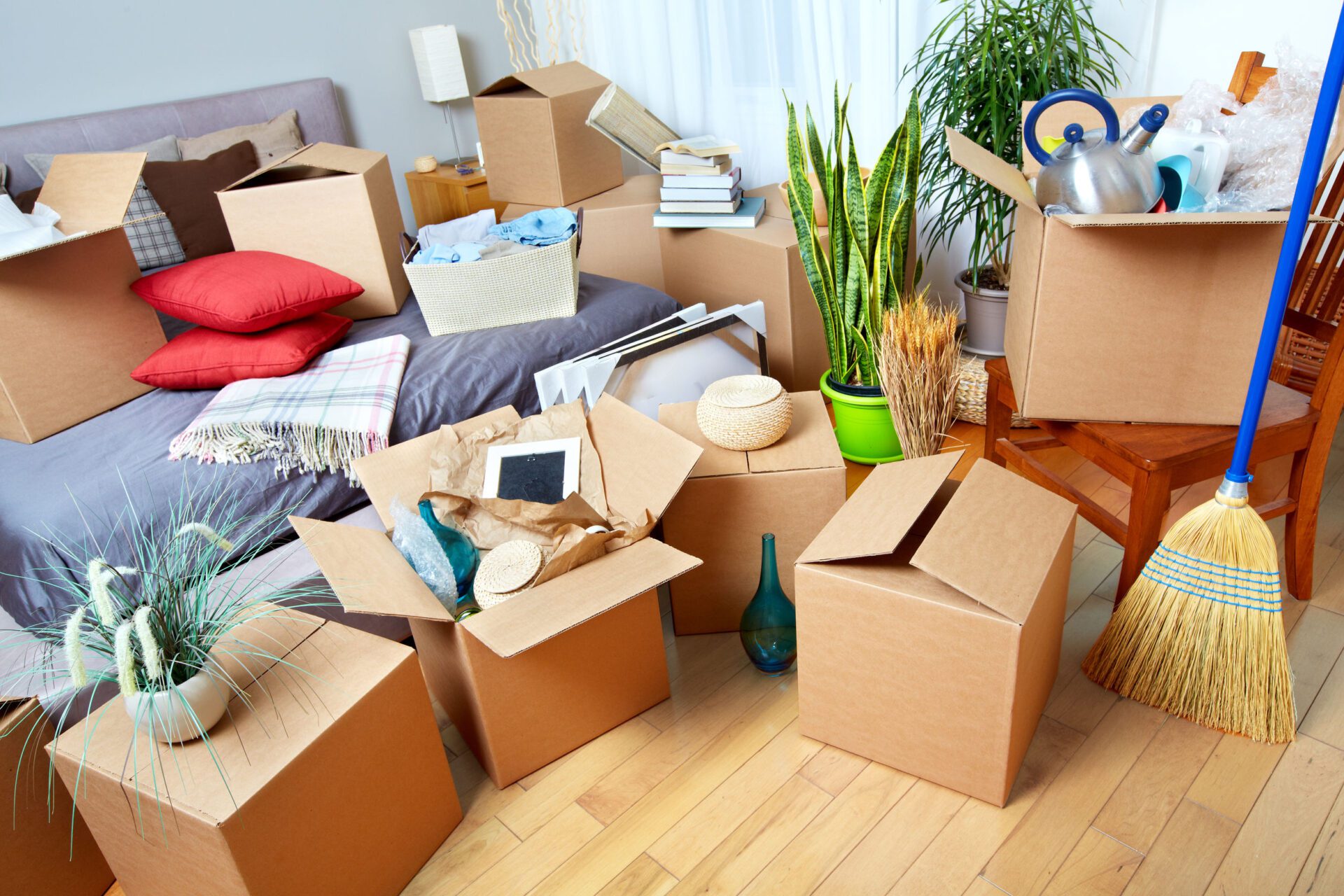 Moving boxes in new house. Moving boxes in new house. Real estate concept.